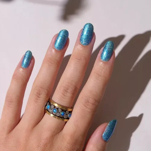 Aqua-Glitter-Nails-InStyle-Tropical-Nail-Ideas-ef6bb1204c704ea497c8b0a33051ad6c
