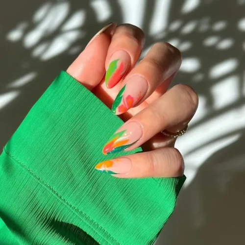 Coral-and-Green-Abstract-Tropical-Tips-InStyle-Tropical-Nail-Ideas-6a526652e0524858a78eb0621b028058